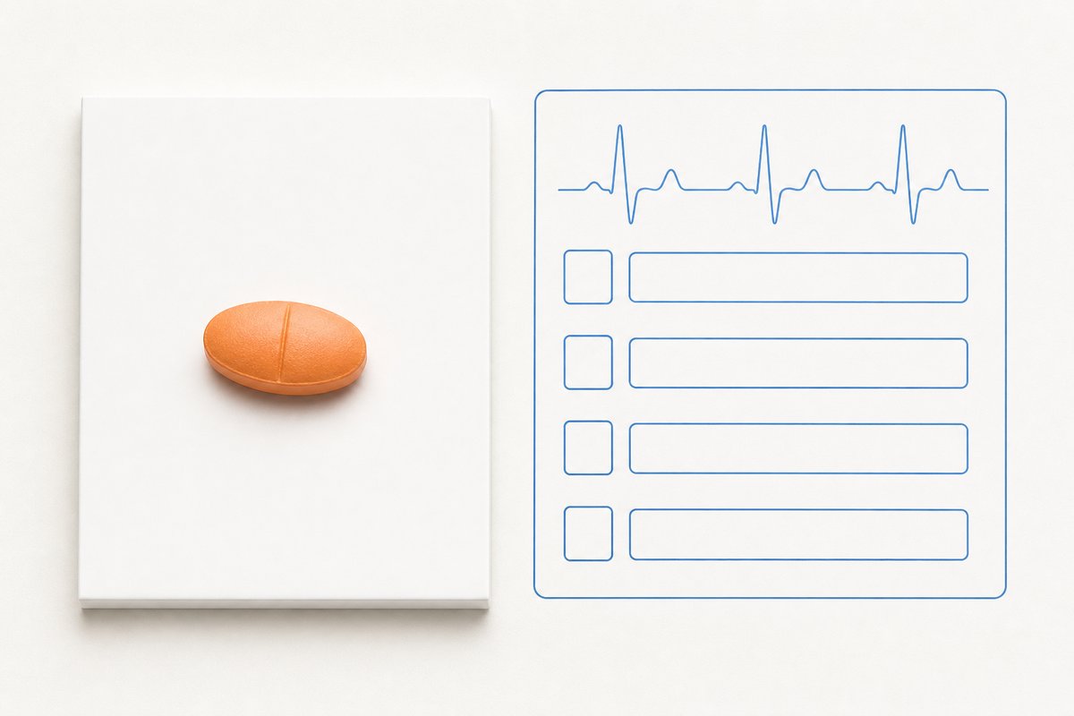 Orange vardenafil tablet on white card beside a QT-screen checklist outline